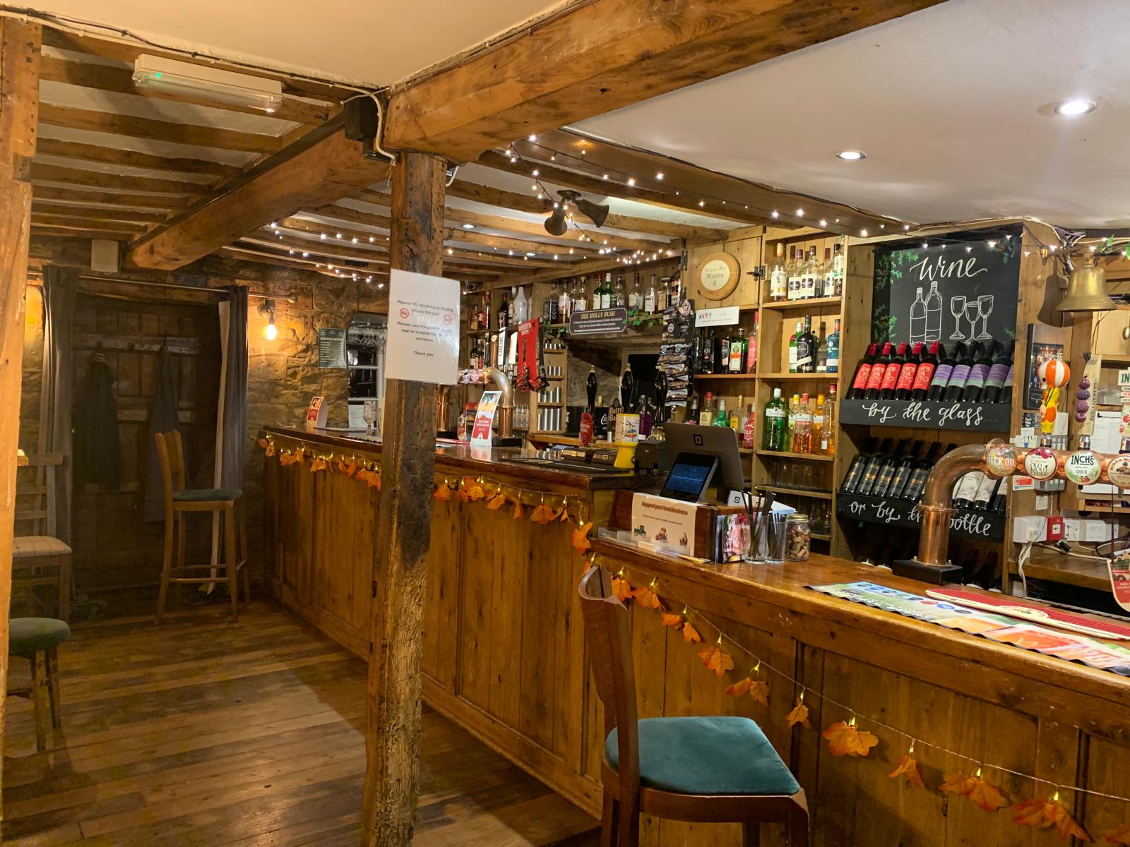 Cosy wooden bar at The Hollybush Inn